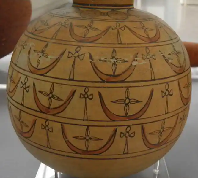 Cross on a crescent on a globular vase